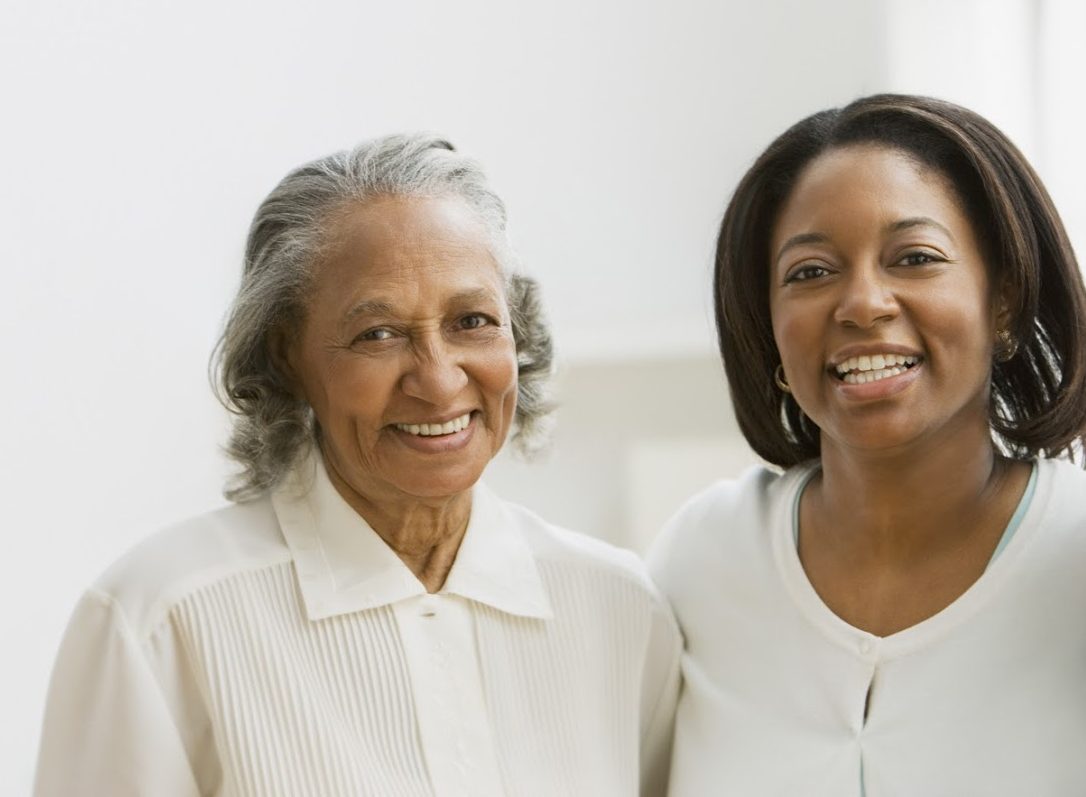 African mother and adult daughter